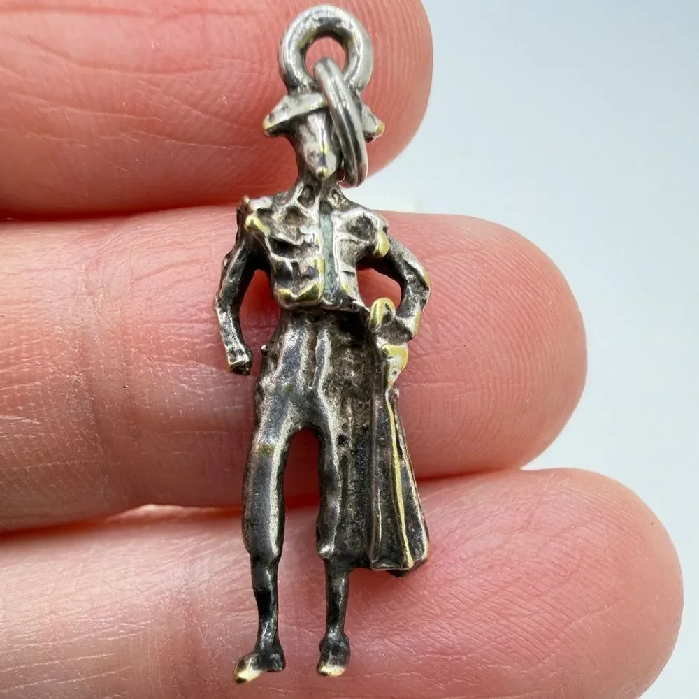Silver tone metal Vintage Matador Charm/Pendant!‎